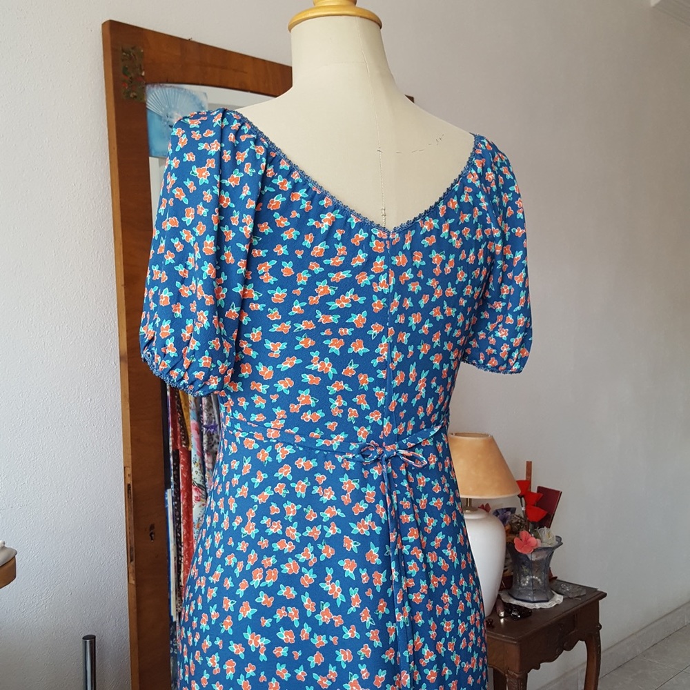 Hand made, elegant, graceful dress is designed by Veronique Manga Bell.